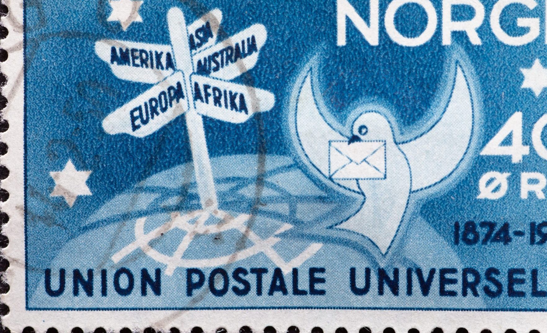 Drawing of a postal pidgeon and a sign post on a commemorative stamp 'Union Postale Universelle', Norway